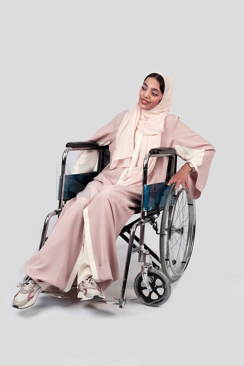 Girl sitting in wheelchair