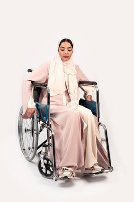 Girl sitting in wheelchair
