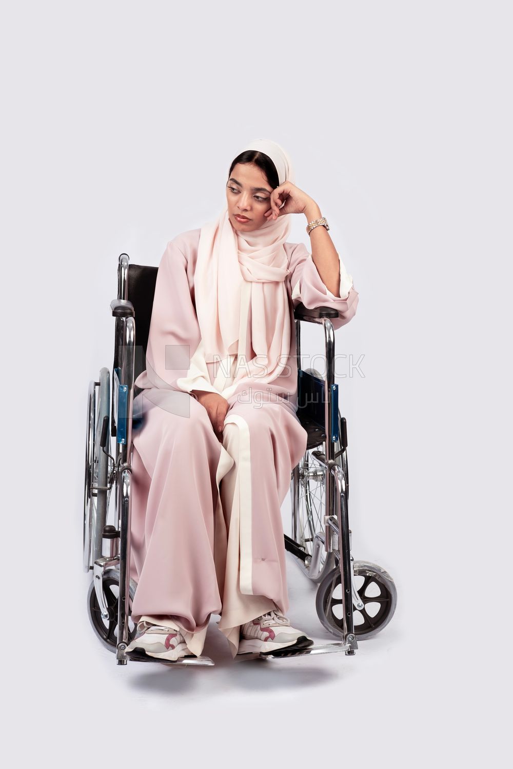 Girl sitting in wheelchair