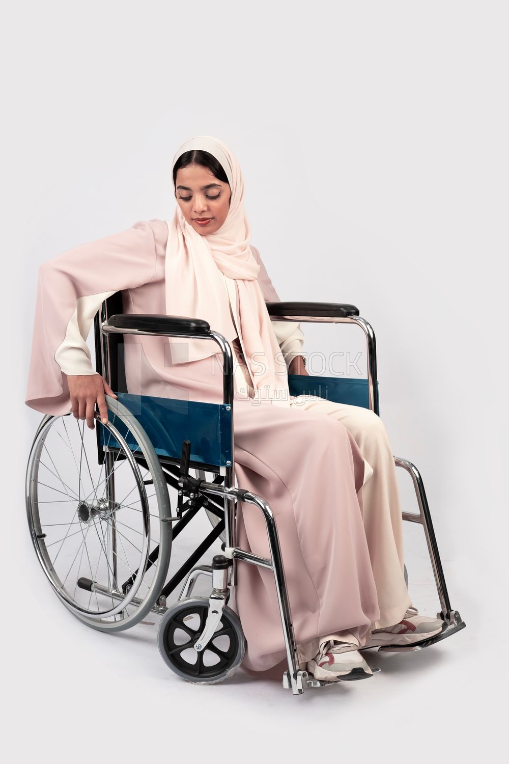 Girl sitting in wheelchair