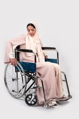 Girl sitting in wheelchair