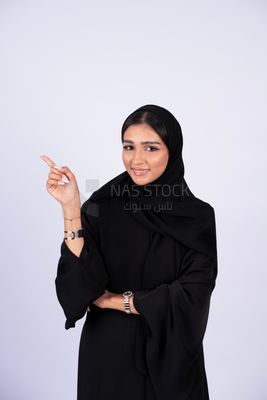 Gulf woman wearing black abaya and hijab