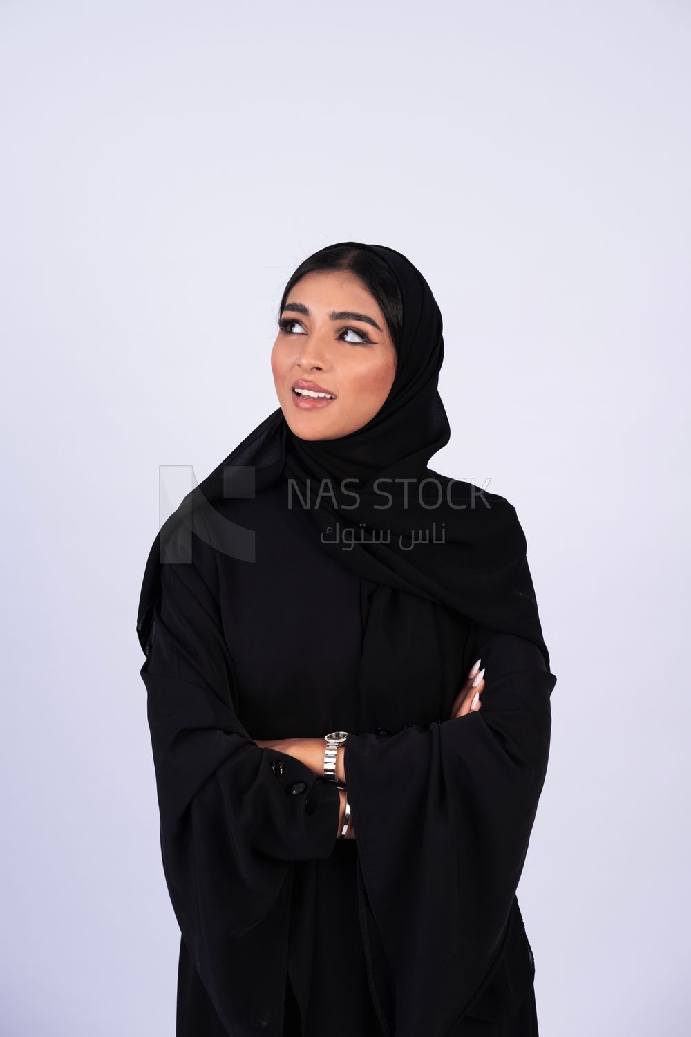 Gulf woman wearing black abaya and hijab