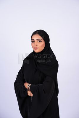 Gulf woman wearing black abaya and hijab