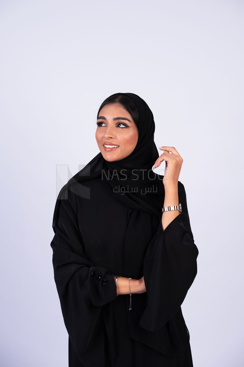 Gulf woman wearing black abaya and hijab