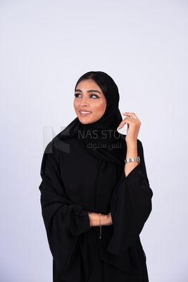 Gulf woman wearing black abaya and hijab