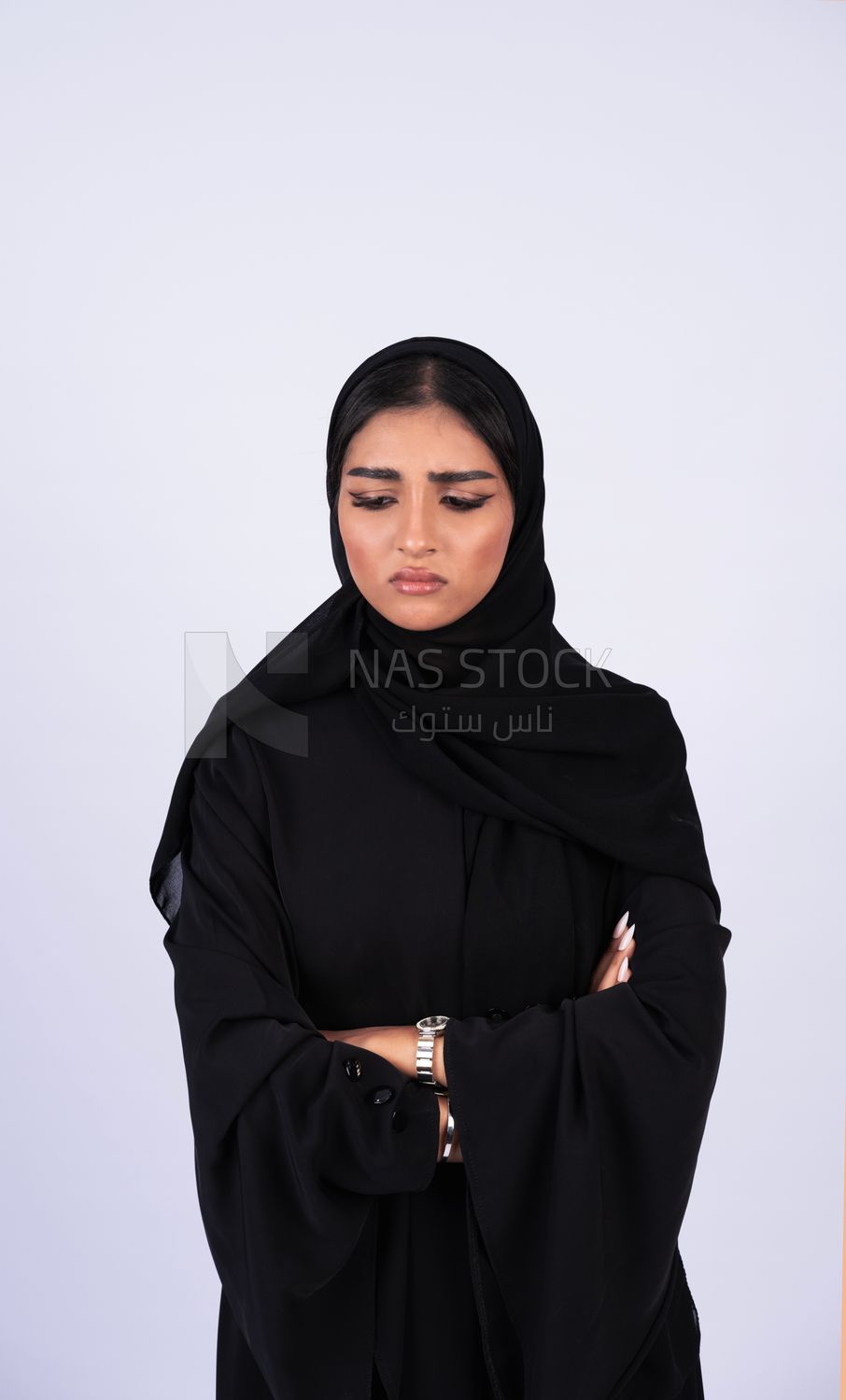 Gulf woman wearing black abaya and hijab