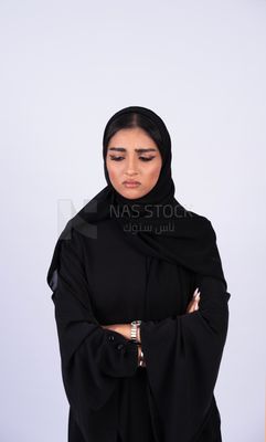 Gulf woman wearing black abaya and hijab