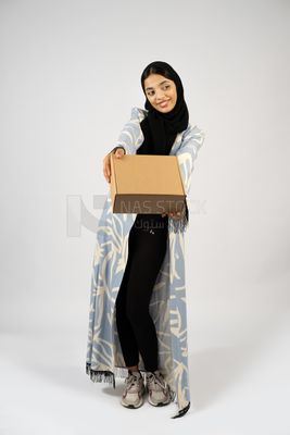 Gulf girl holding a special order box