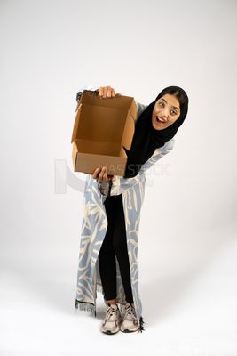 Gulf girl holding a special order box
