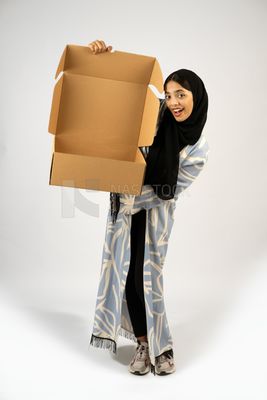 Gulf girl holding a special order box