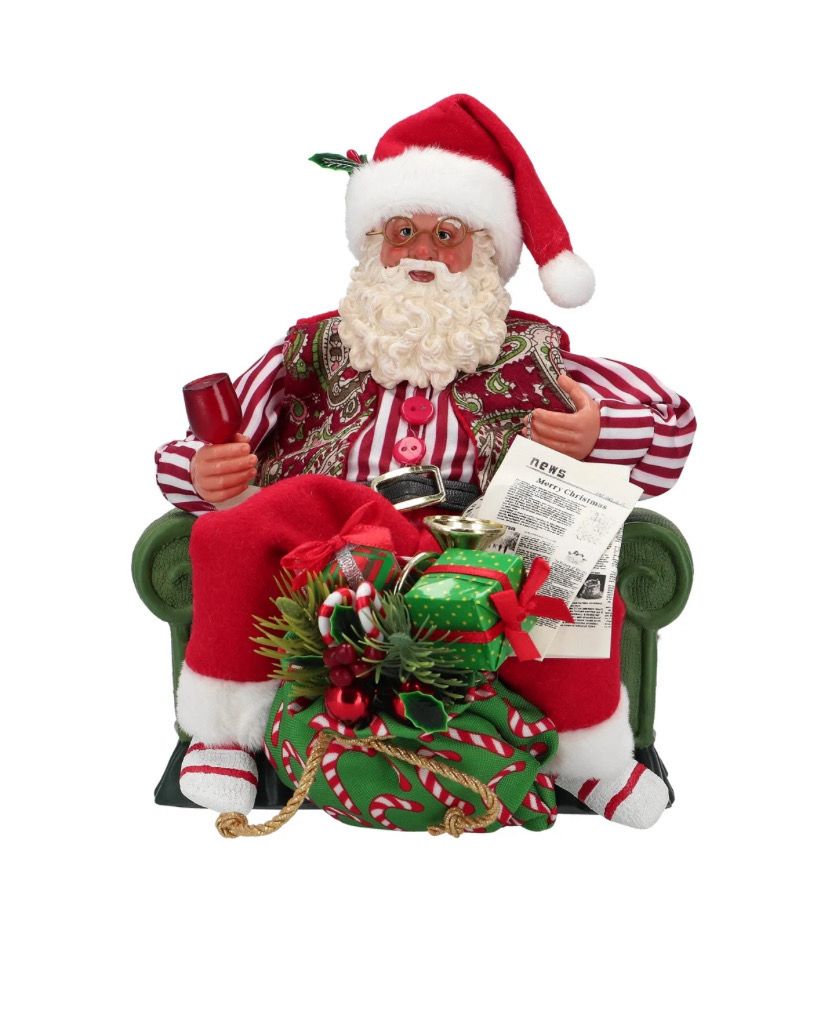 Père Noël assis dans son fauteuil