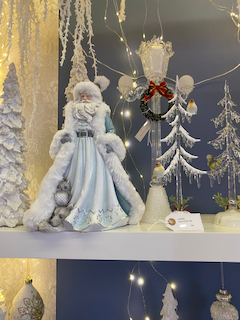 Père Noël bleu clair avec ses animaux