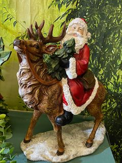 Père noël sur son renne