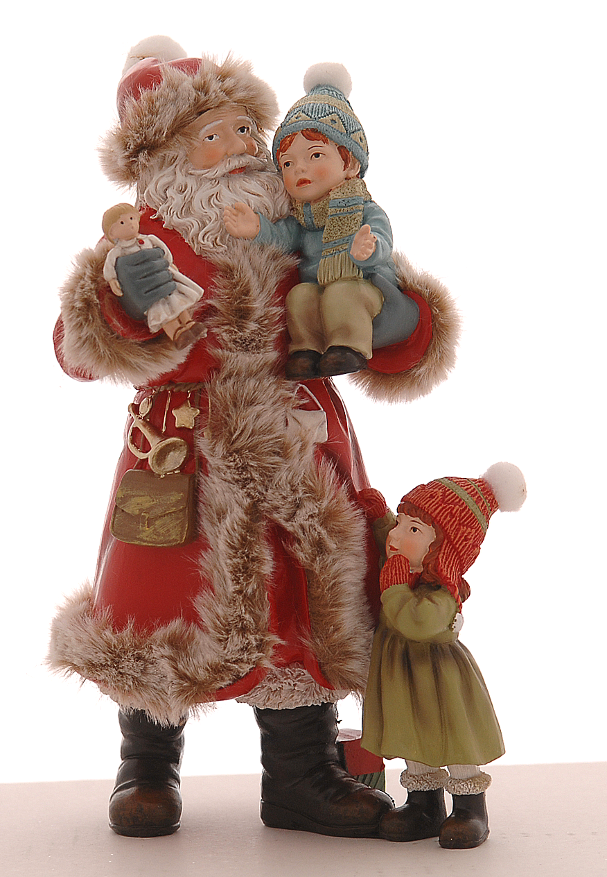Père Noël debout portant un enfant