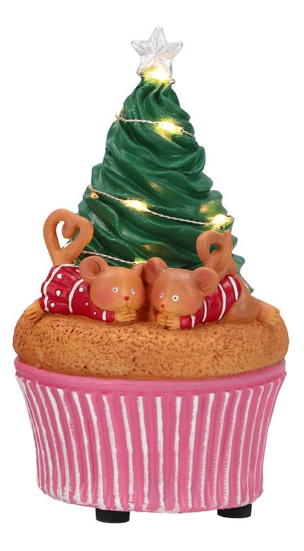 Cupcake souris allongée devant sapin souris allongés sur cupcake devant un sapin