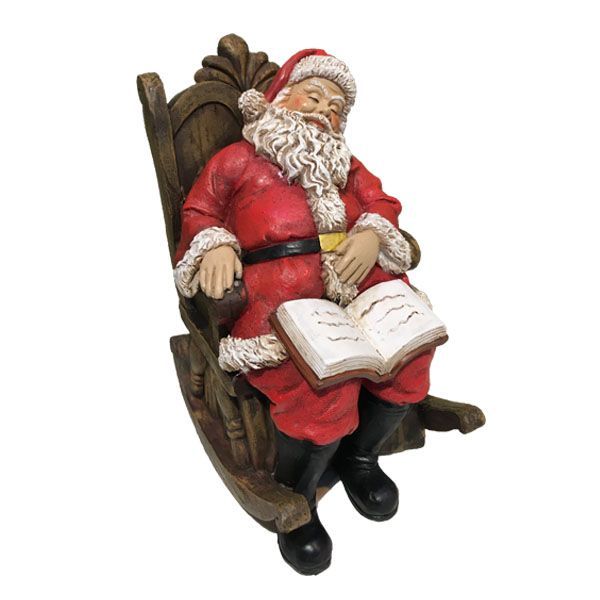 Père Noël endormi sur son fauteuil