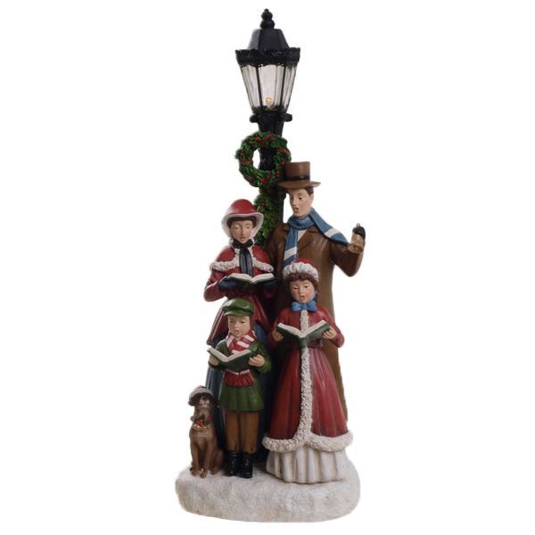 Chanteur de dickens sous lampadaire Chanteur de dickens sous lampadaire