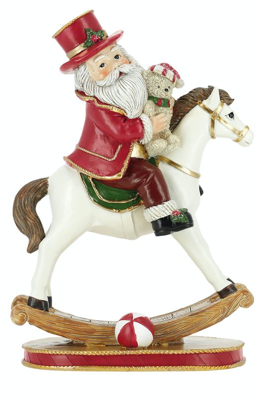 Père Noël  sur cheval à bascule