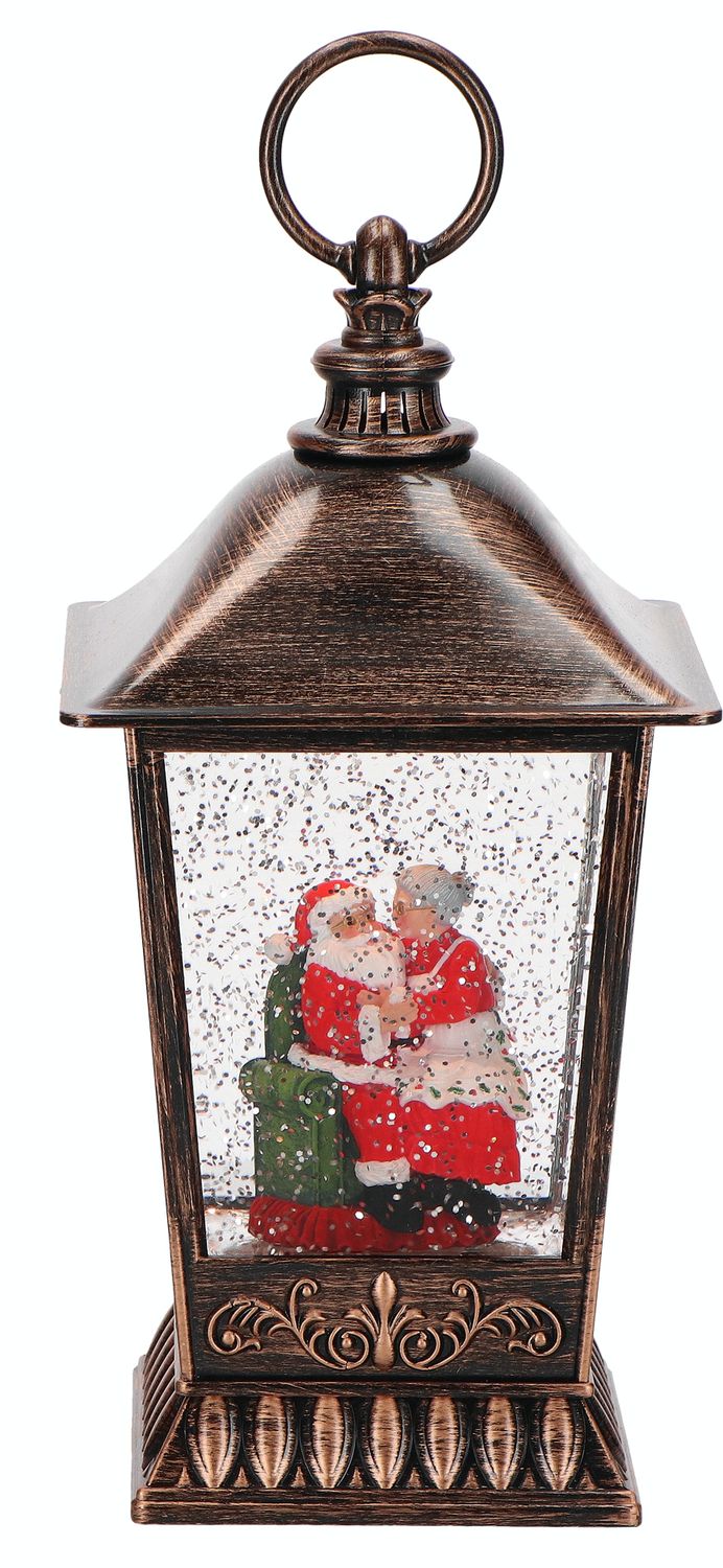 Lanterne à eau LED Père et Mère Noël confortablement installés dans un élégant fauteuil vert Lanterne à eau LED Père et Mère Noël confortablement installés dans un élégant fauteuil vert