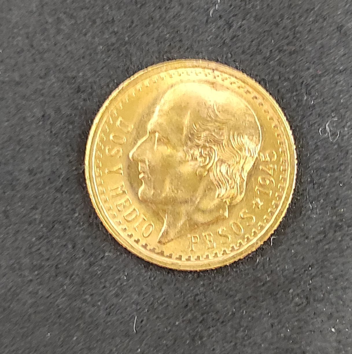 2 pesos ½ ( or )