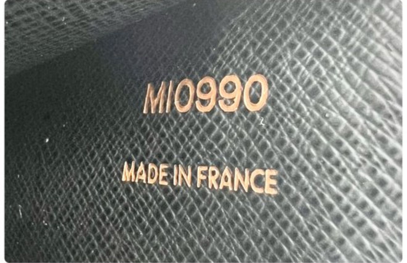 Louis Vuitton Black Serie Dragonne Clutch Epi leather bag