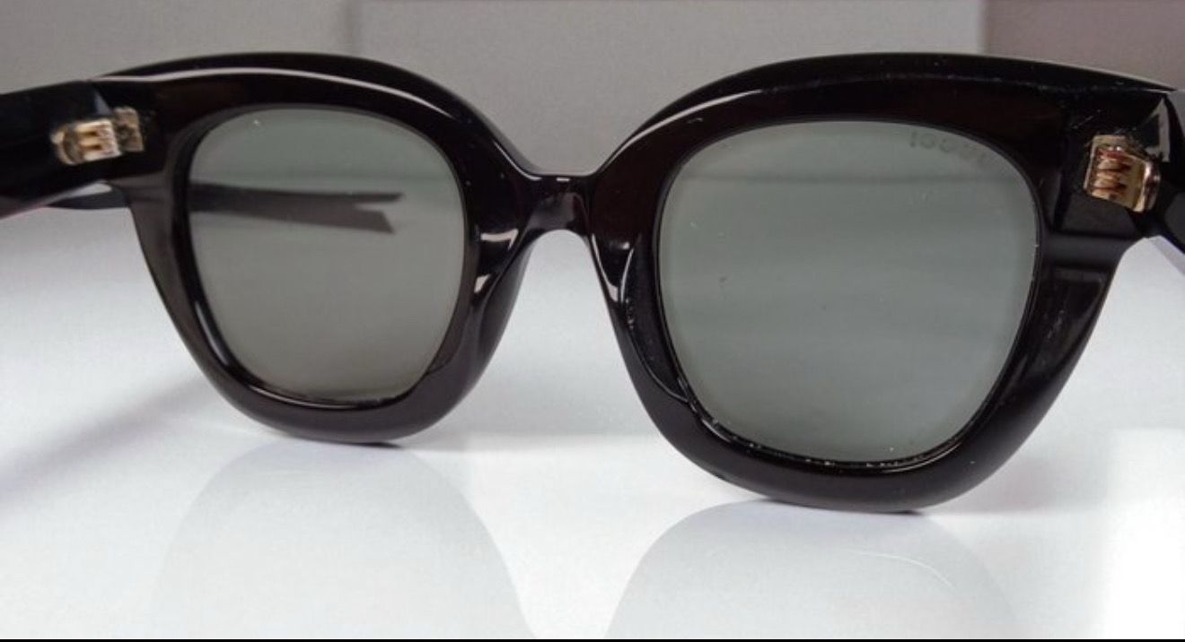 Gucci Black Sunglasses with Gold Accents