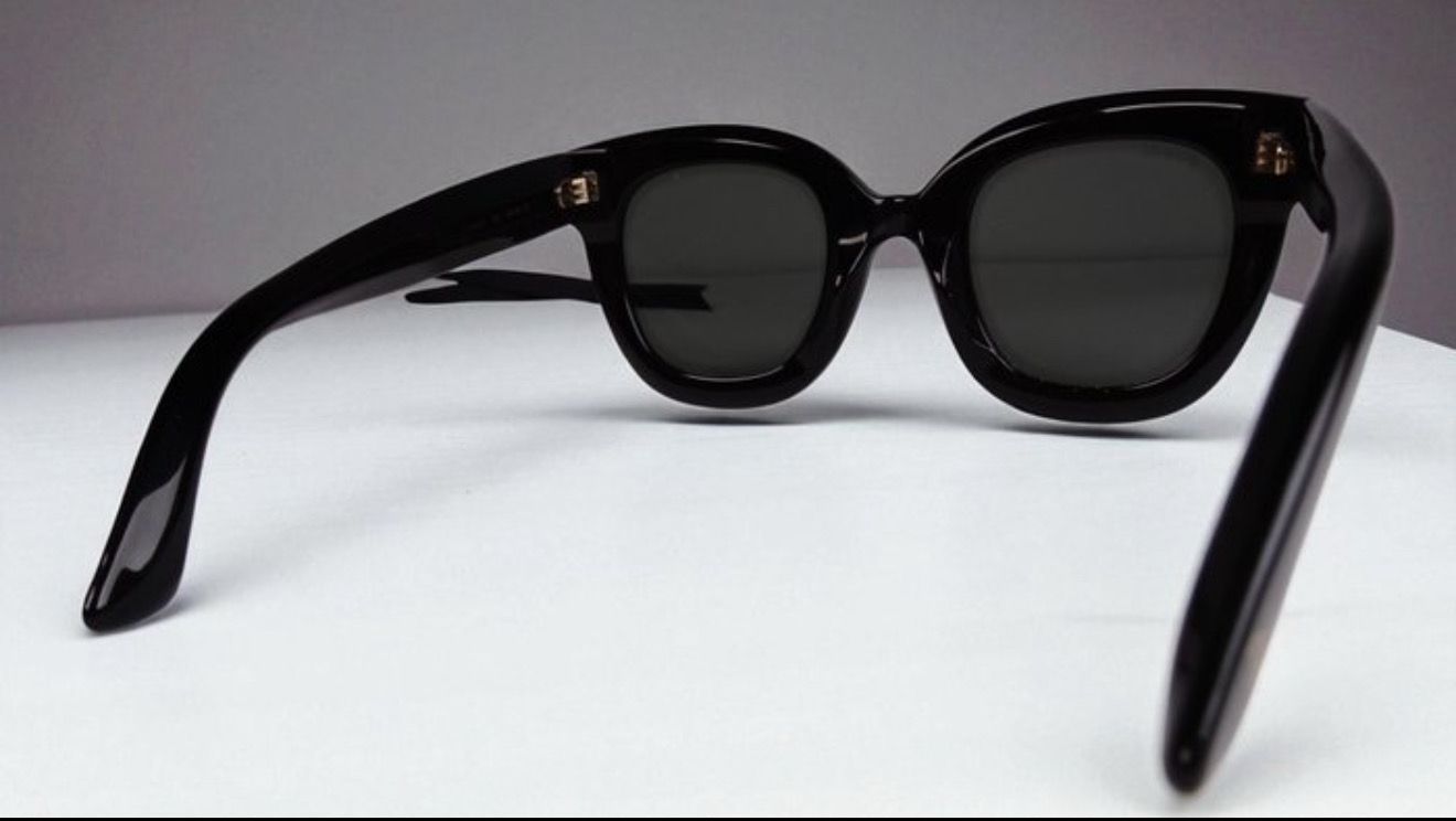 Gucci Black Sunglasses with Gold Accents