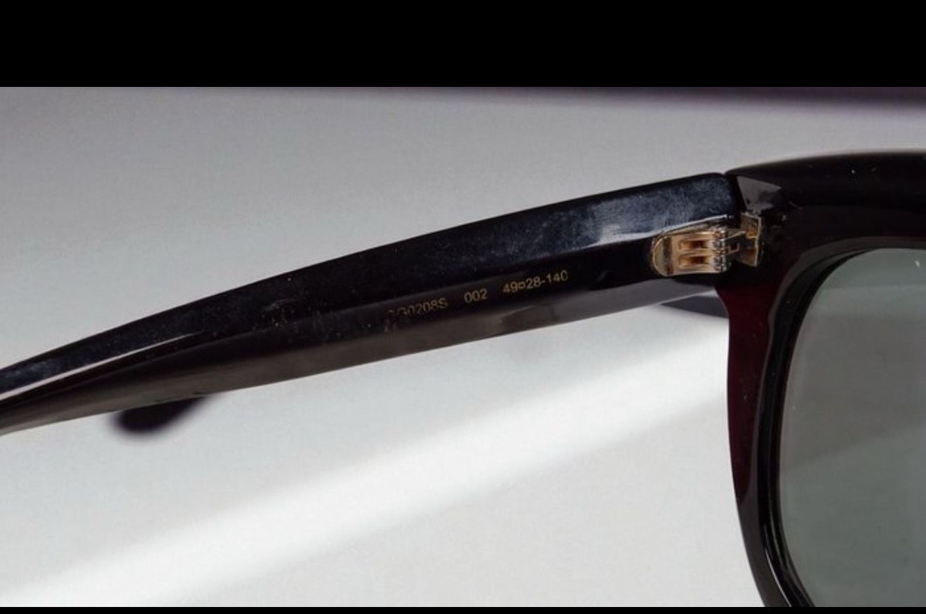 Gucci Black Sunglasses with Gold Accents