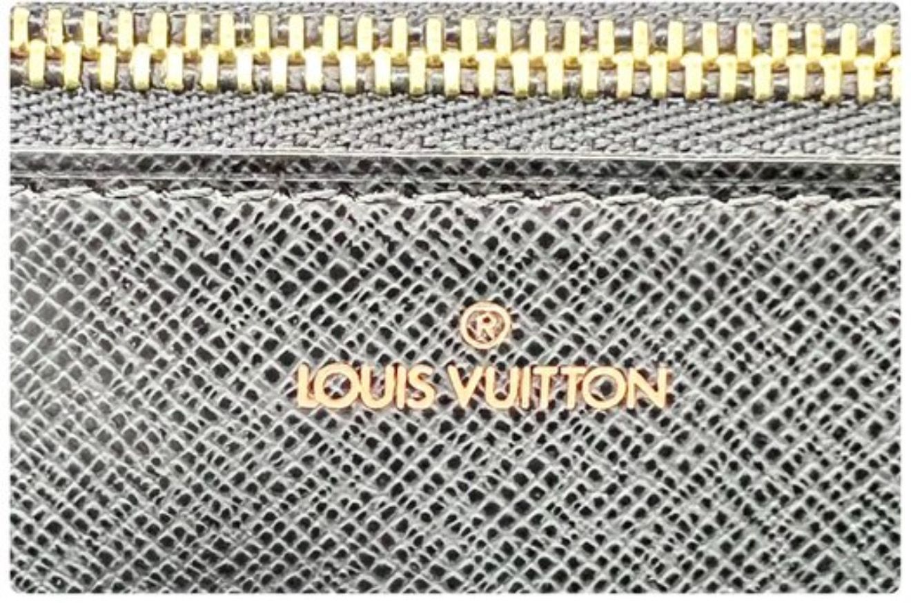 Louis Vuitton Black Serie Dragonne Clutch Epi leather bag
