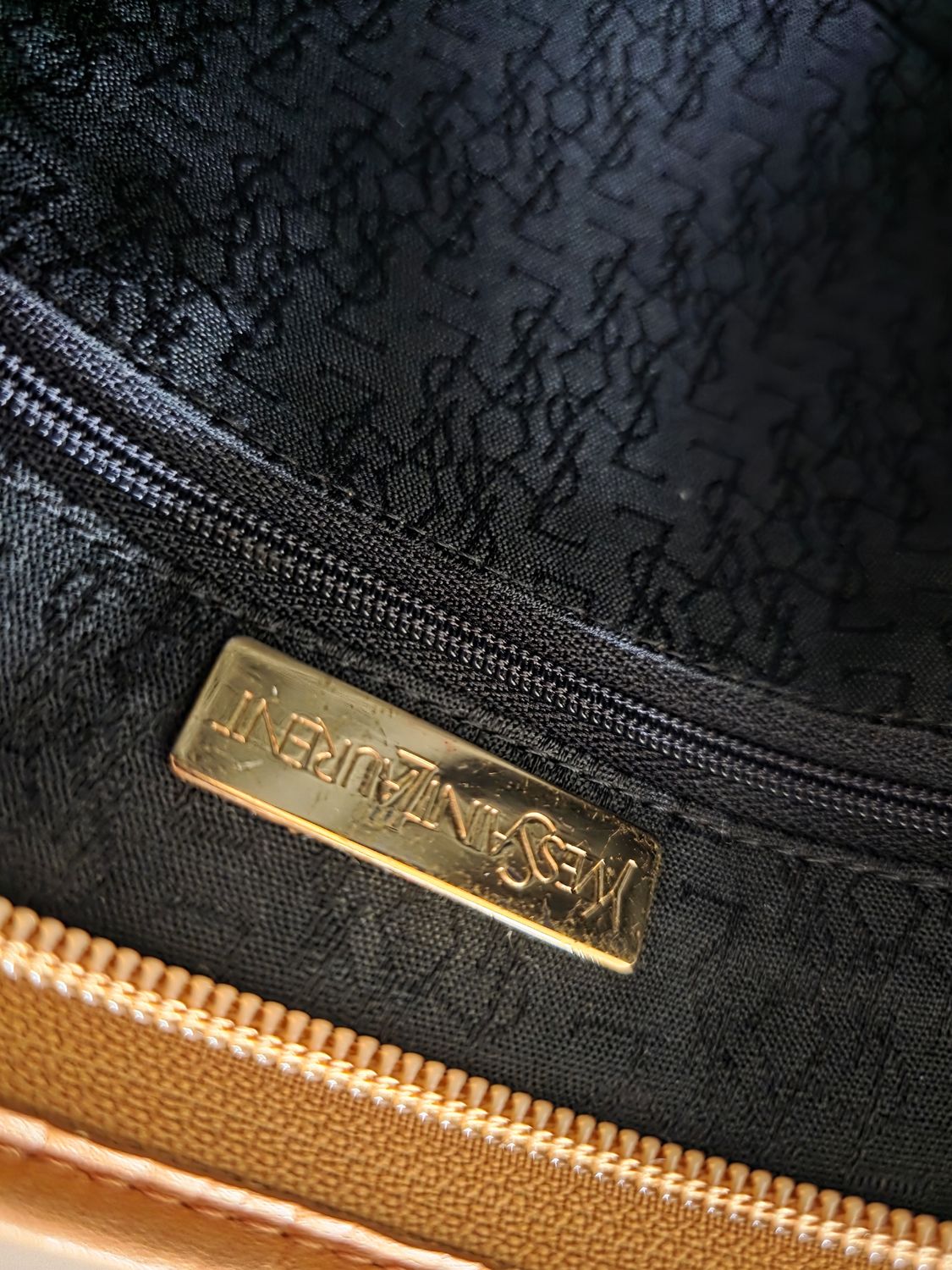 Name Yves Saint Laurent pouch black and camel