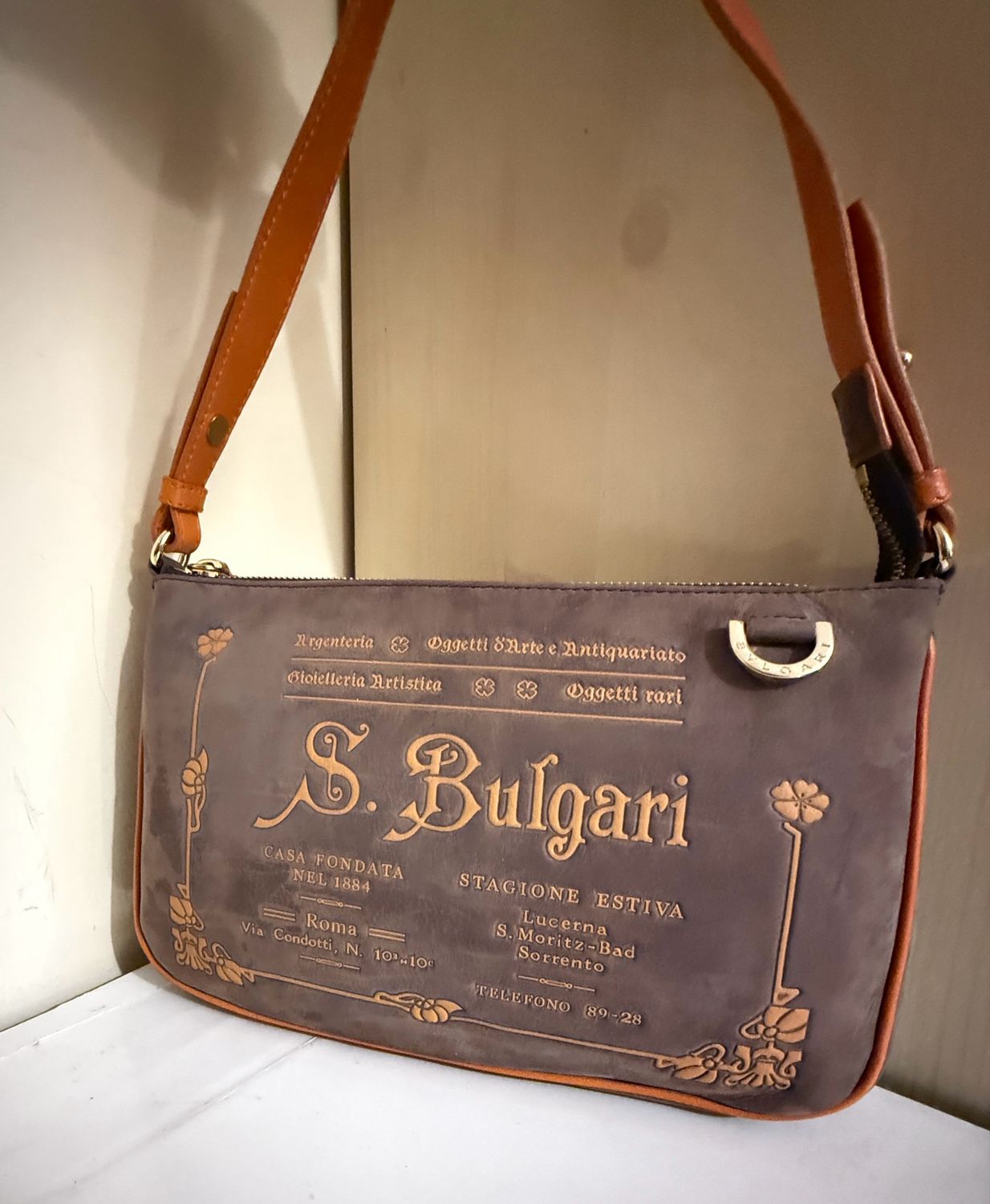 Bvlgari Slogan-debossed Shoulder Bag In Purple