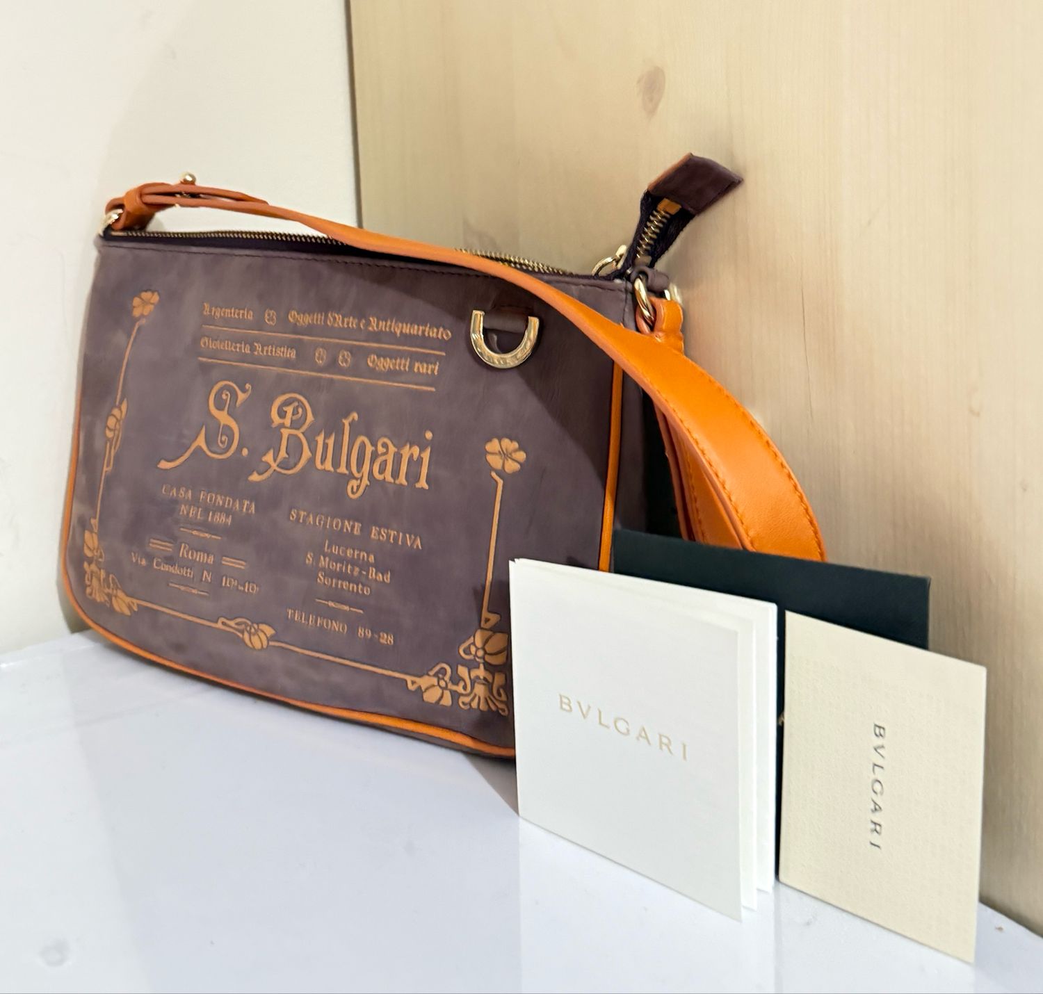 Bvlgari Slogan-debossed Shoulder Bag In Purple