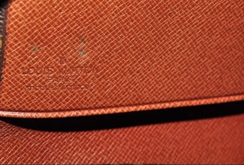 Louis Vuitton pochette Lava monogram leather 