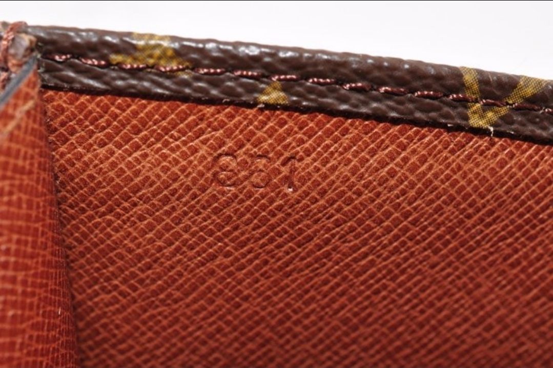 Louis Vuitton pochette Lava monogram leather 