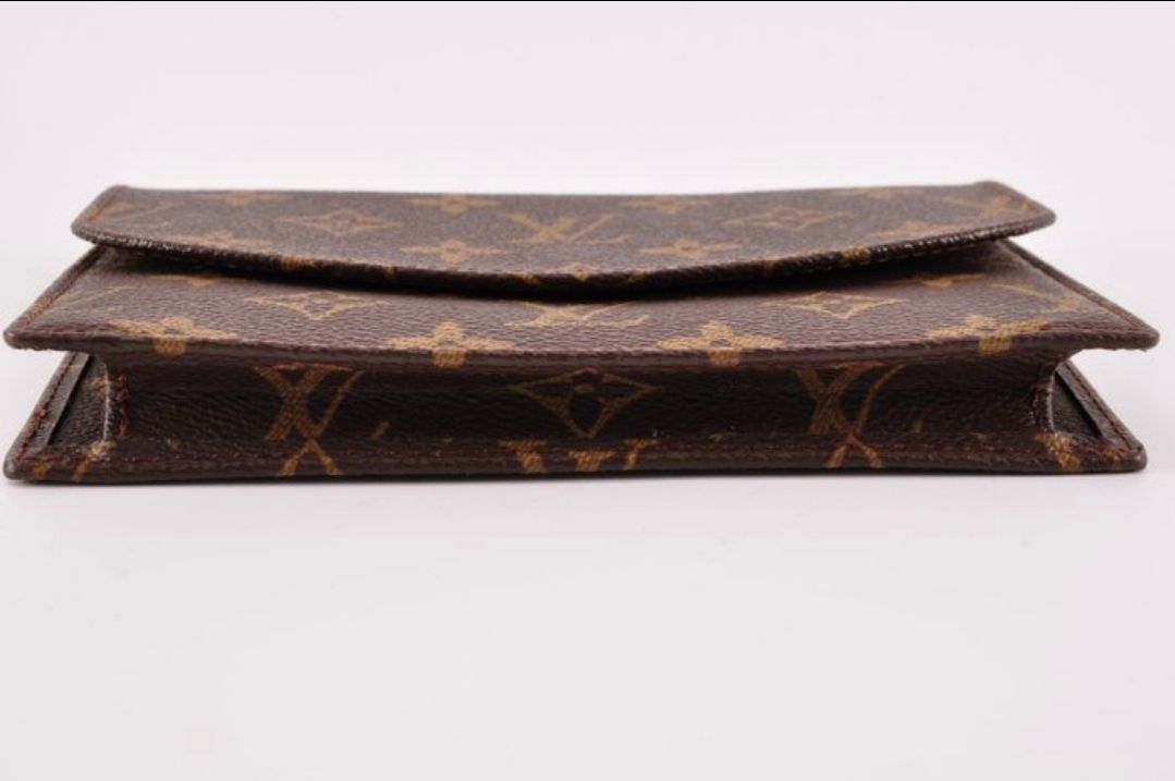 Louis Vuitton pochette Lava monogram leather 