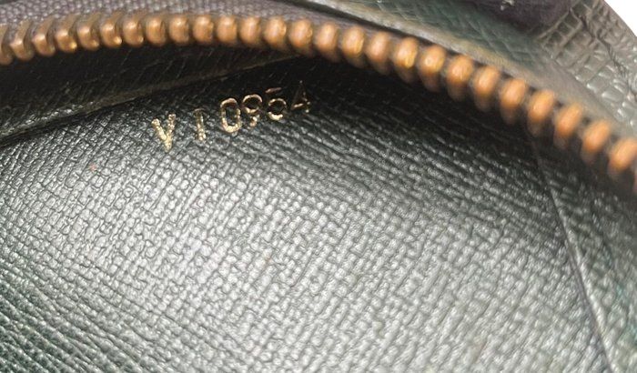 Louis Vuitton Baikal Tiaga leather pouch Green