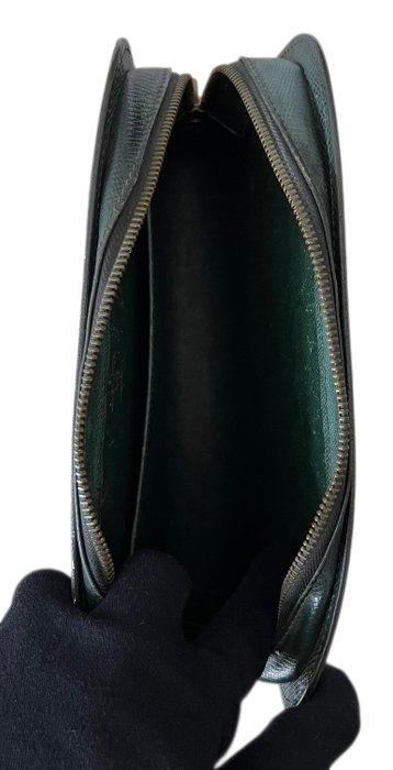 Louis Vuitton Baikal Tiaga leather pouch Green