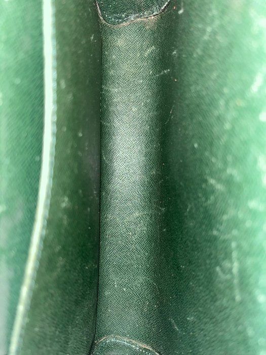 Louis Vuitton Baikal Tiaga leather pouch Green