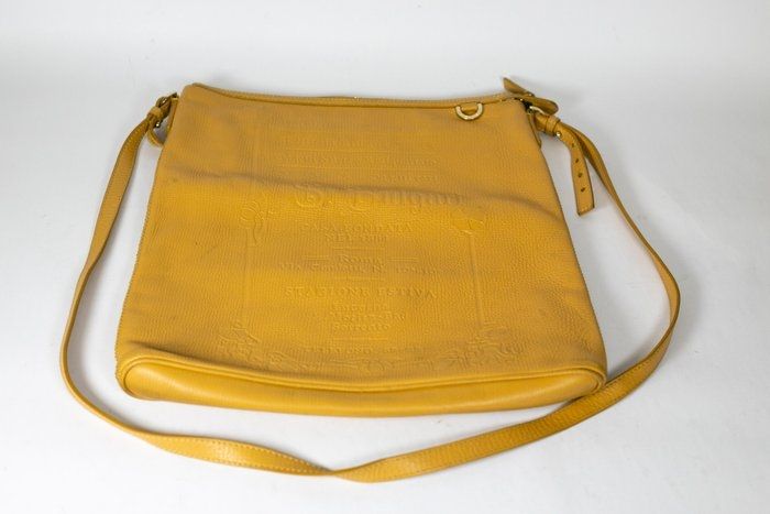 Bvlgari embossed slogan leather bag