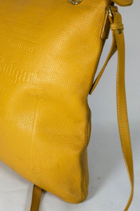 Bvlgari embossed slogan leather bag