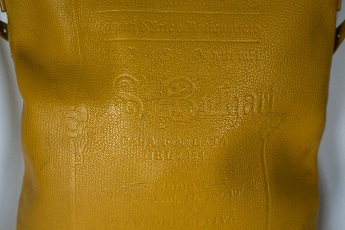 Bvlgari embossed slogan leather bag