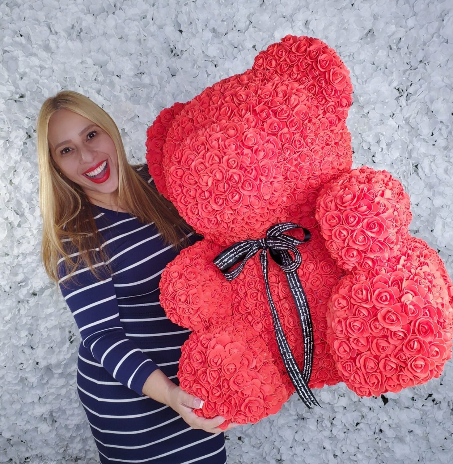 Giant rose on sale teddy bear