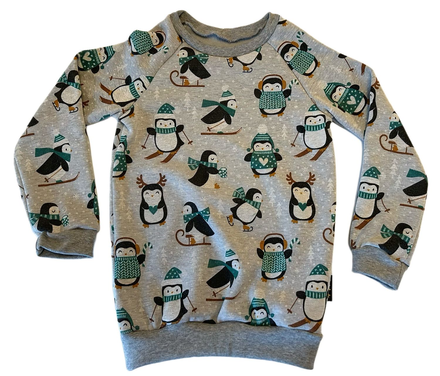 Raglanpulli Fleece mit Pinguinen