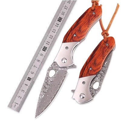Damascus SS flower with tooled sheath