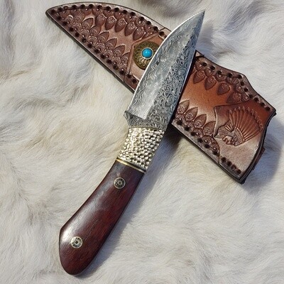 Damascus drop point w/tooled leather sheath