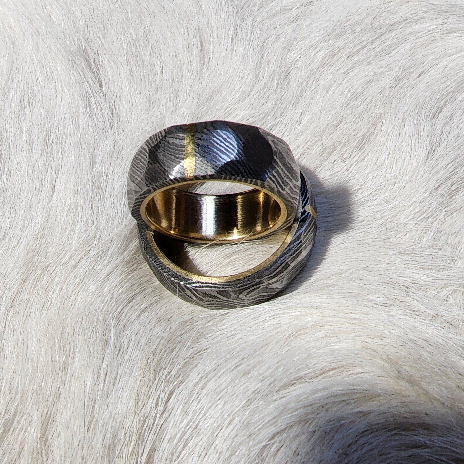 Damascus and gold his and hers rings