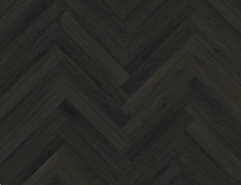 CONTOURS Burned Fischgrat Klick-Vinylboden in Premium-Qualität
Abmessungen: 720 x 120 mm
Nutzschicht: 0,55mm
Gesamtstärke: 8mm (stabile Mittellage mit Klick-System)
VPE: 2,07
Das authentische Design von Burned – Herringbone – IC55 mit seiner Texturtiefe, seiner Schattierung und seinem natürlichen, coolen Look passt gut zu vielen verschiedenen Stilen. Das dunkle Holzdesign ist ein Herringbone-Format mit der Verlegeart Isocore Click 55 (IC55).