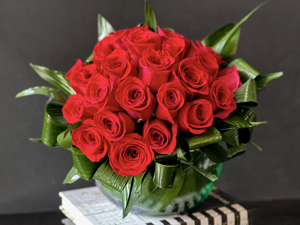 TWO DOZEN RED ROSES IN CLEAR VASE