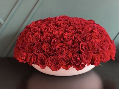 150 RED ROSES IN A CEMENT BOWL